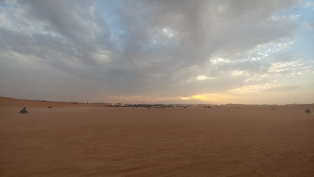The beautiful sky and the designated area for the ATV riders, desert, sand, amazing sky