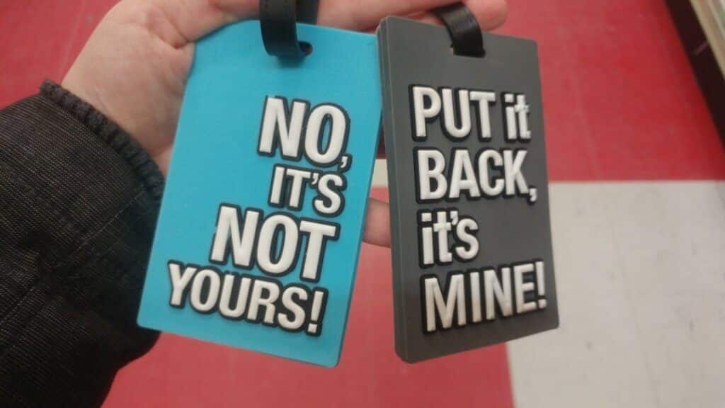 Luggage tags are some of the travel essentials to buy at the Dollar Store, Dollar Store luggage tags