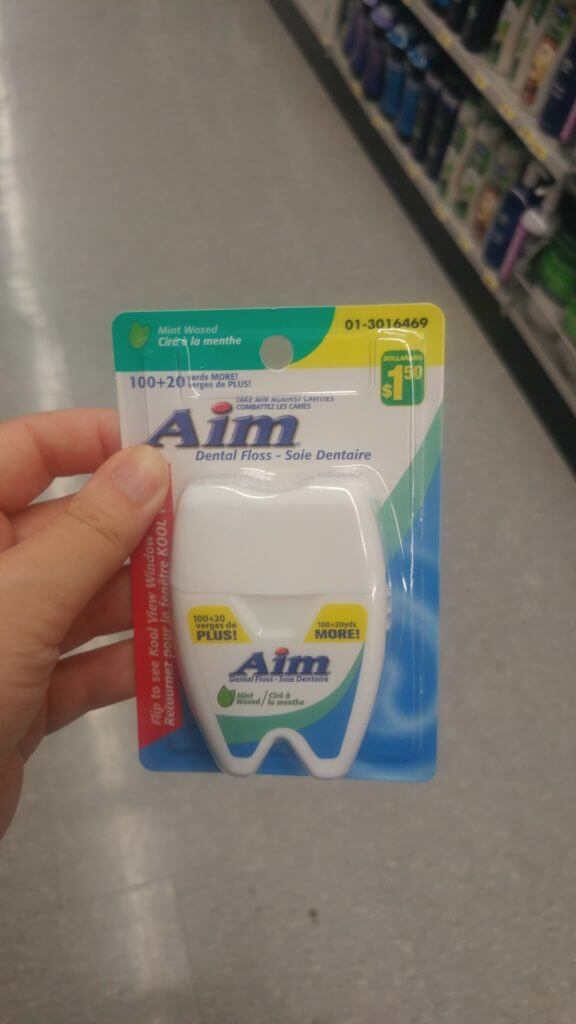 Dental Floss is one of the travel essentials to buy at the Dollar Store