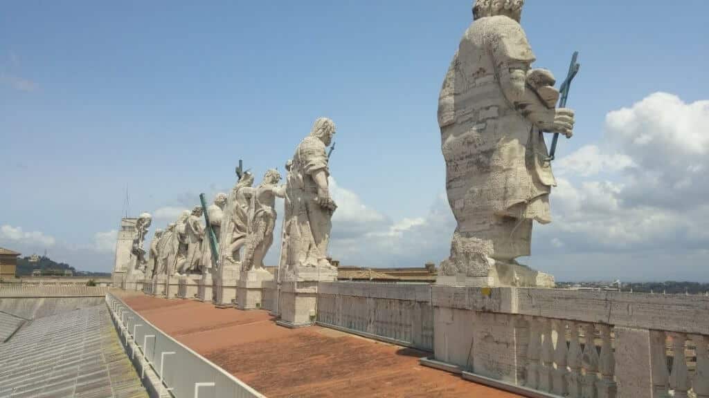 The roof of St. Peter's Basilica behind the Apostol statues