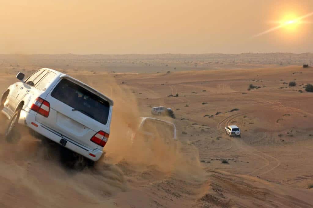 Dune bashing in desert, desert safari, Dubai, jeeps, Dubai Desert Safari activities