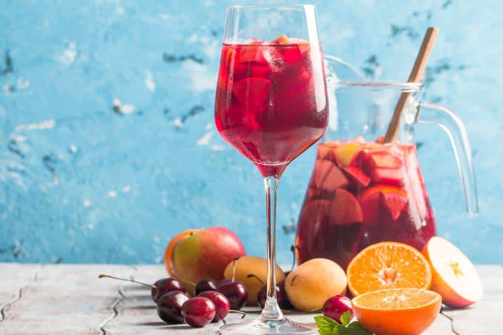 glass of sangria, fruits, a jug of sangria, drink, Spanish drink, alcohol, Foods & drinks to try in Spain