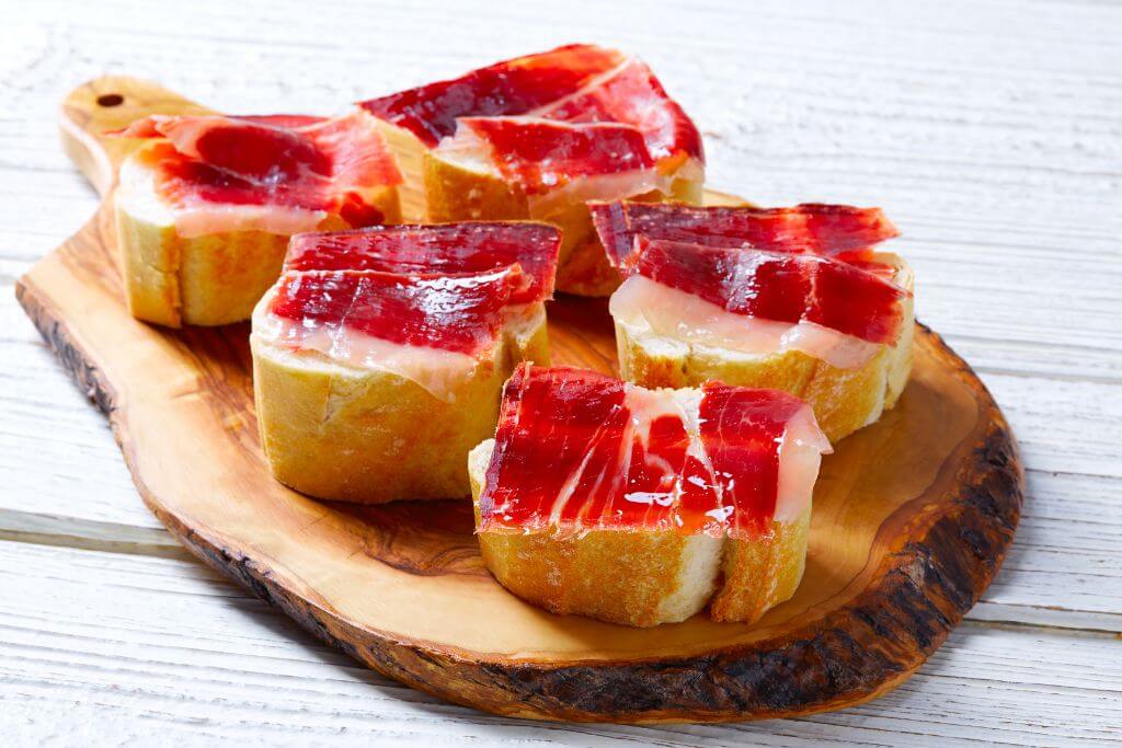 tapas, Iberian ham on bread, Iberian ham, pork cured meat, Foods & drinks to try in Spain, Traditional food and drink in Spain