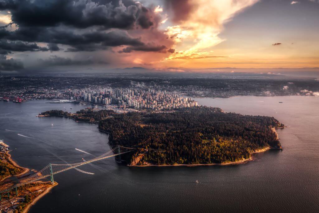 Aerial view of Stanley Park and Vancouver, Lions Gate Bridge 