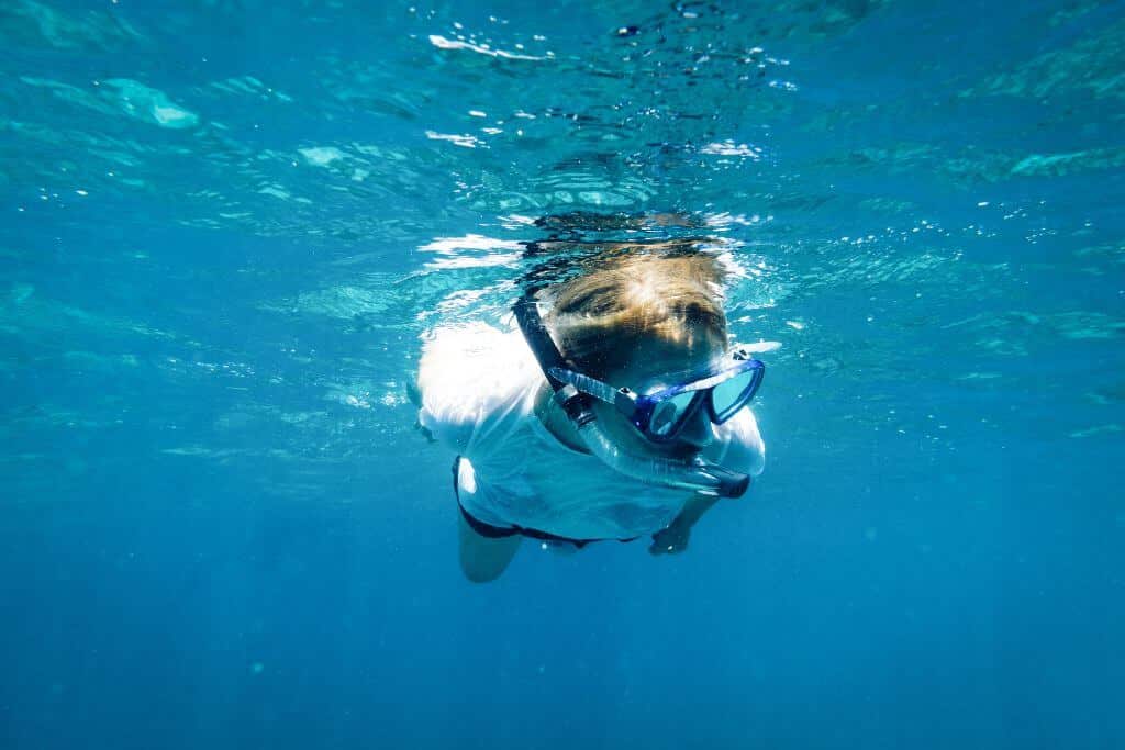 Snorkeling is one of the things to do in Playa Blanca, swimming, beach activity