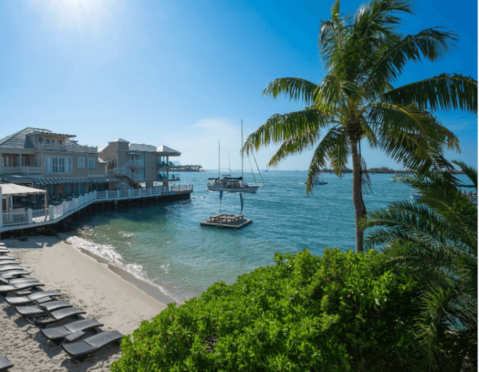 Key West vacations for couples - Pier House Resort & Spa, beach, palm trees