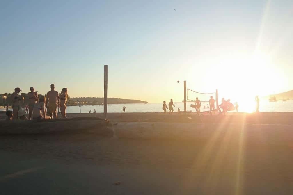 People enjoying Kits Beach, Vancouver
