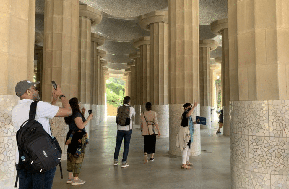 A tour group exploring Park Guell, Barcelona attractions