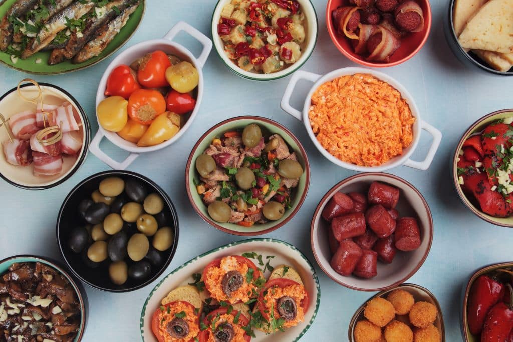 Selection of tapas on a table, tapas tours in Barcelona