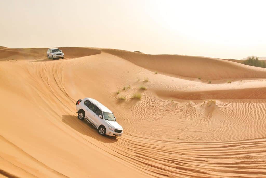 Dune bashing in a 4x4 jeep during a desert safari, uae, desert