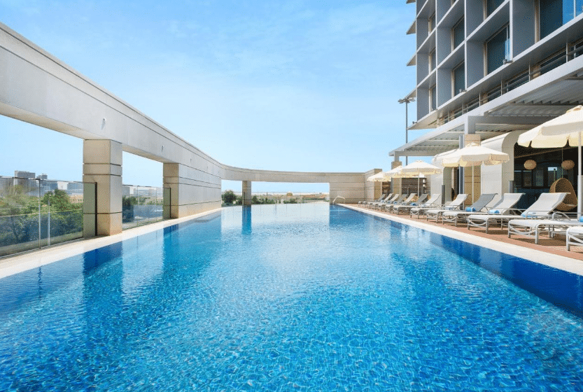 Aparthotel Adagio Abu Dhabi Al Bustan Pool, terrace, lounge chairs, places to stay in Abu Dhabi