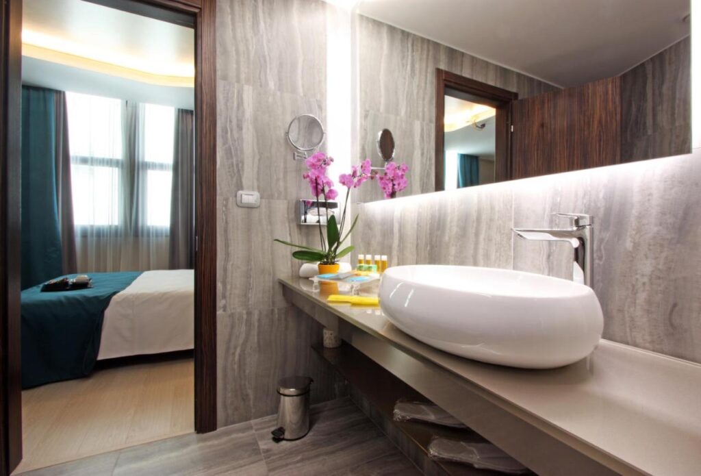 A bathroom in the Hive Hotel, sink, bathroom, toilet, toiletries,  hotels near Roma Termini