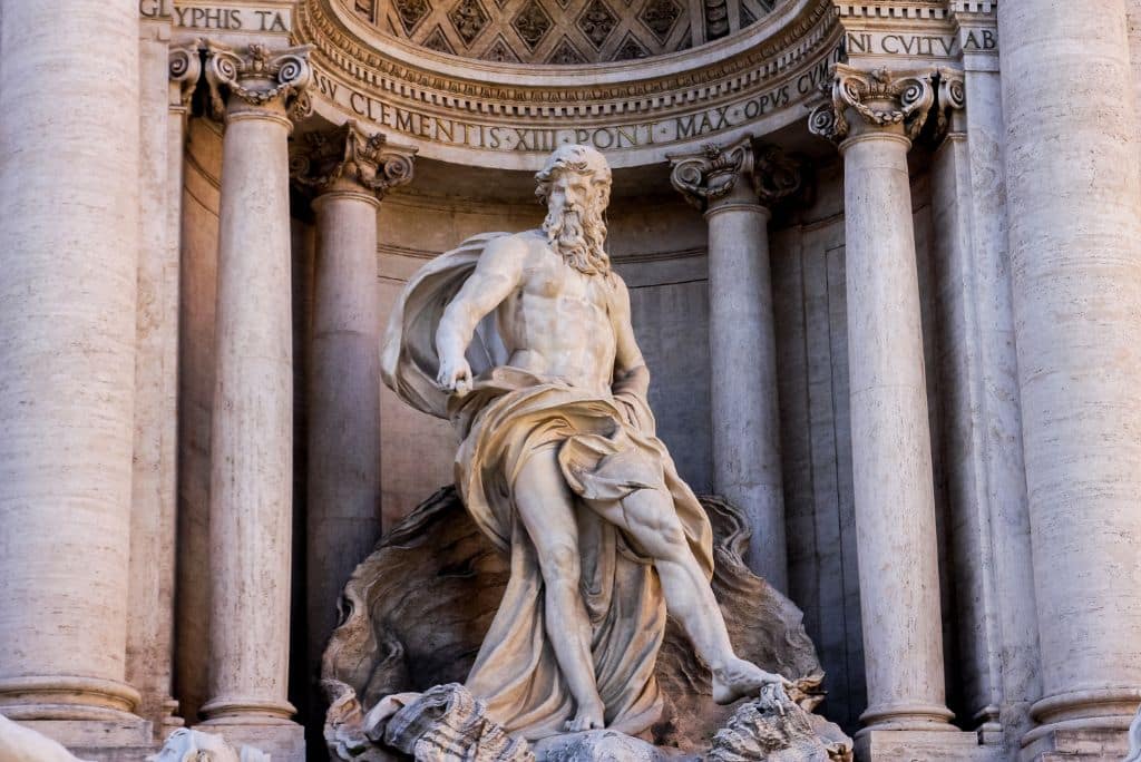 Statue of Neptune in the center of the Trevi Fountain, Rome attractions 