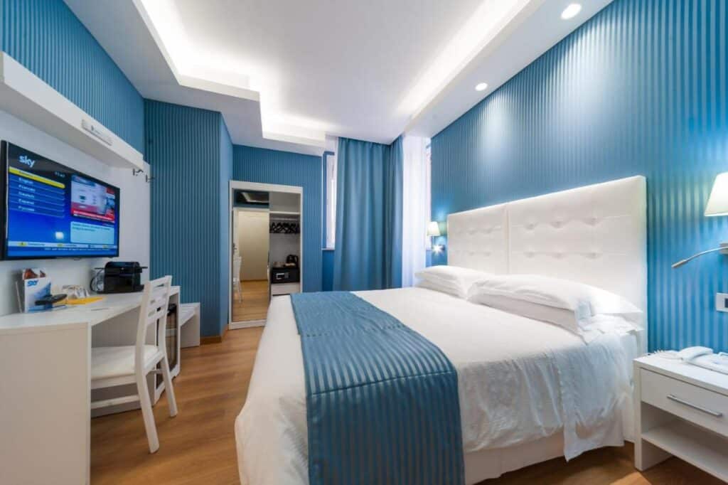 Superior Double or Twin Room in Trevi 41 Hotel, blue décor, bed in a hotel, tv, desk