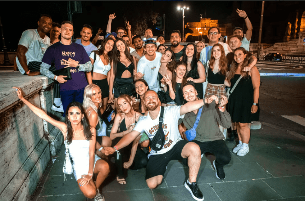 A group of people doing a Pub Crawl in Rome