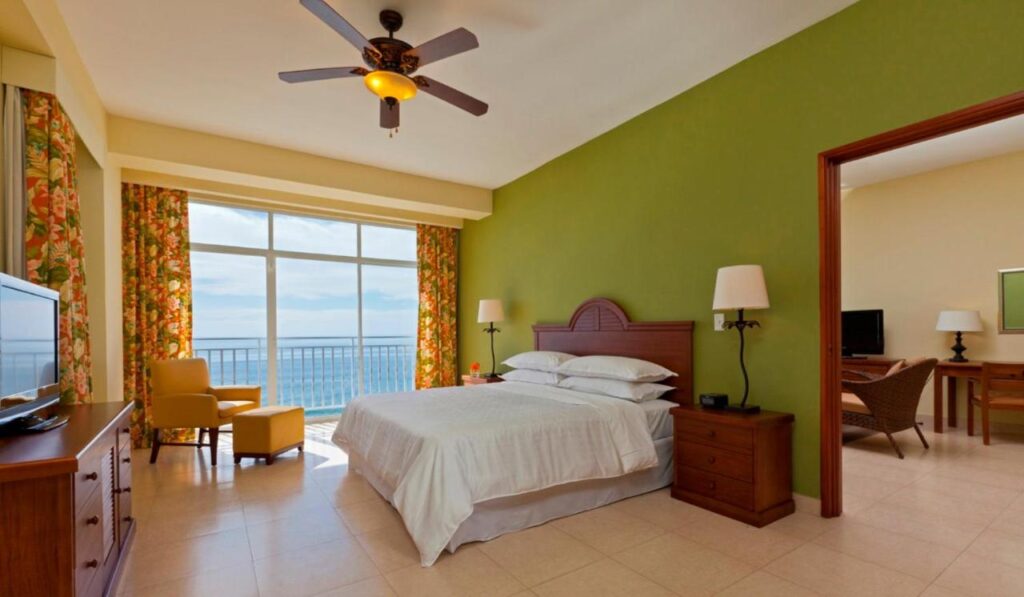 Bijao Beach Resort by Evenia room, large bed, beach view, Playa Blanca hotels 
