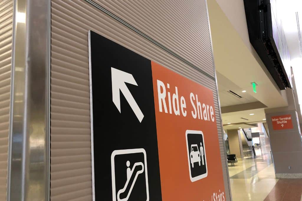This is an example of what the signs at the airport look like, pointing to where the Ride Share pick-up area is