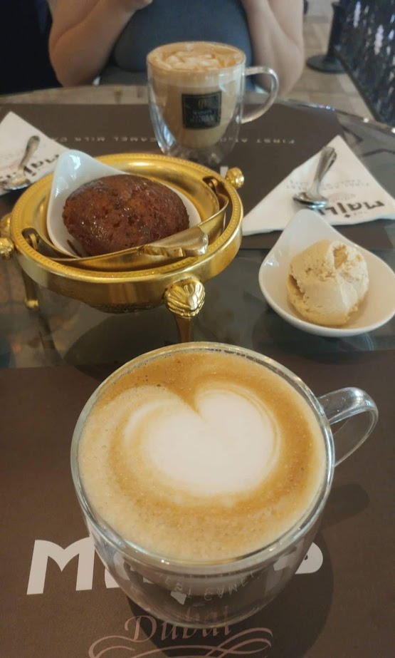 Camelccino, camel milk ice cream, and a date cake in The Majlis, coffee, camel products