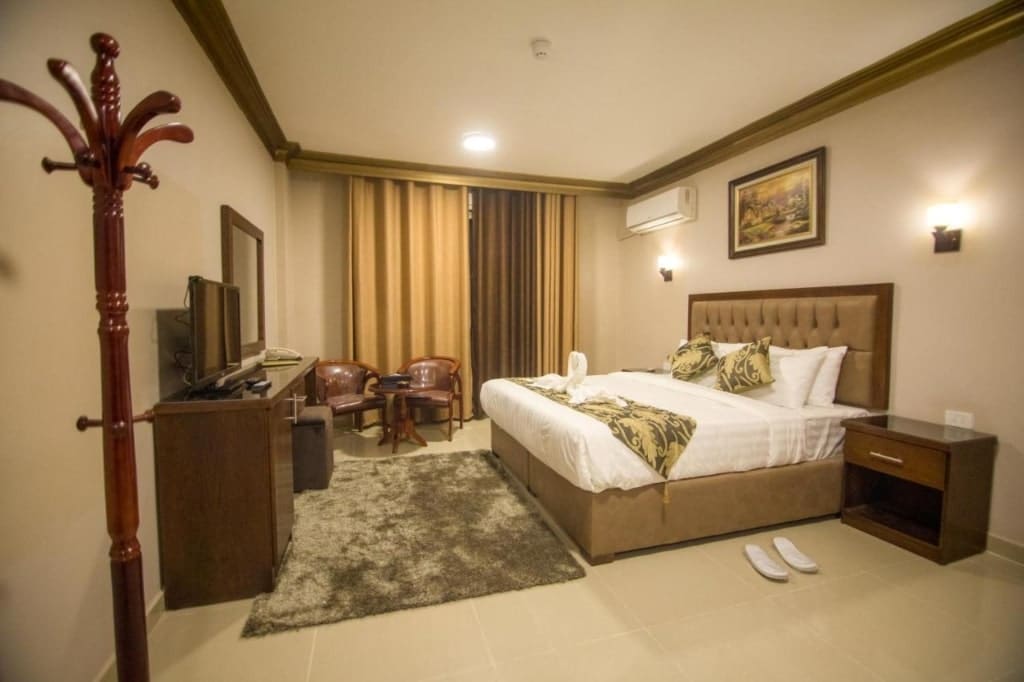 A room in Grape Village Hotel, hotel bed