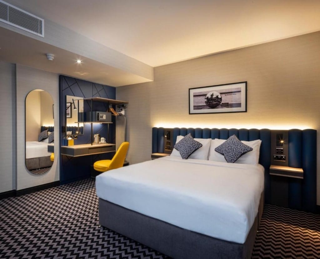 A room in the Academy Plaza Hotel, hotel room with a large bed, Dublin Hotels Near Croke Park