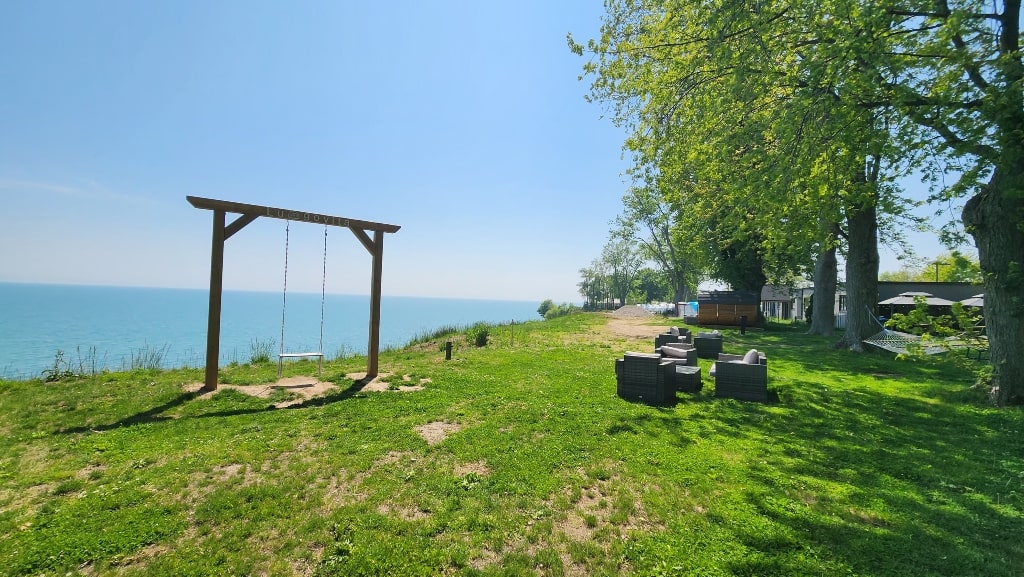 One of the swings, sitting area, hammocks and view of Lake Erie, Lungovita Beach Resort Review