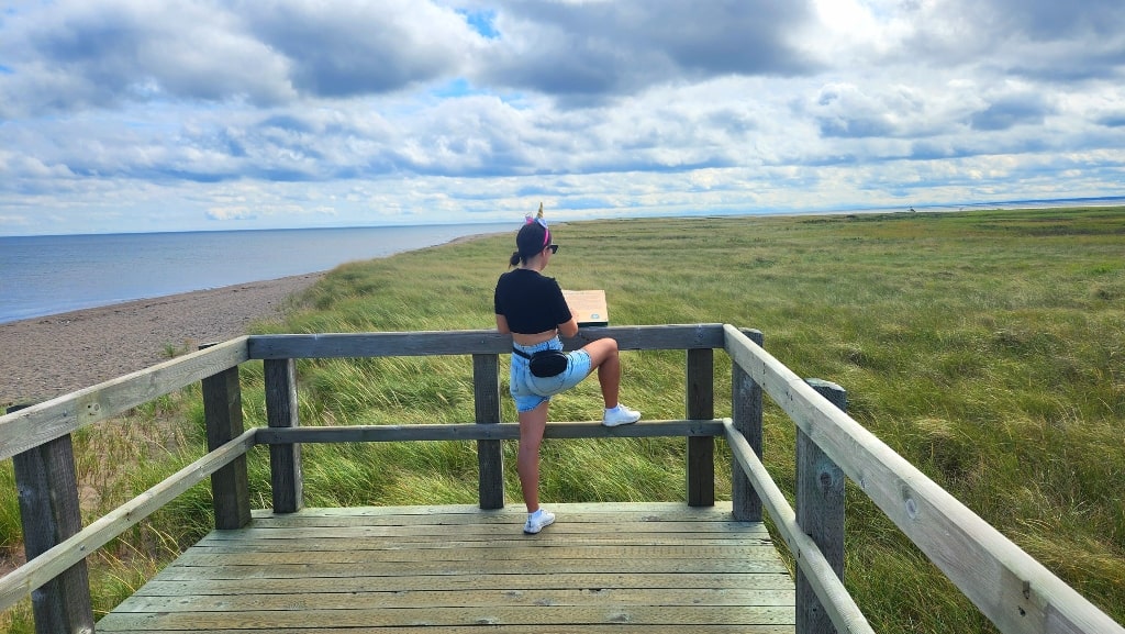 Bouctouche Dunes, nature, a girl standing on a boardwalk