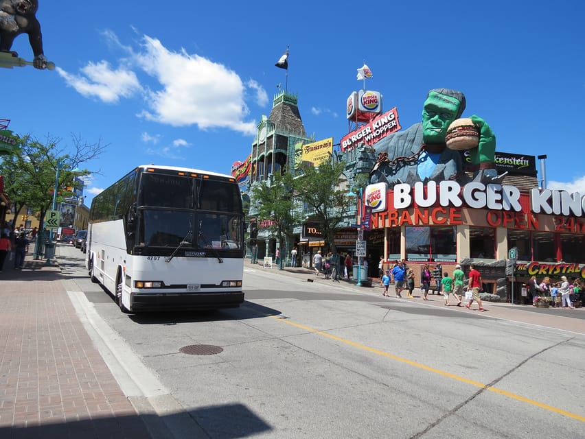 The tour bus on Clifton Hill, a white bus, Niagara Falls 