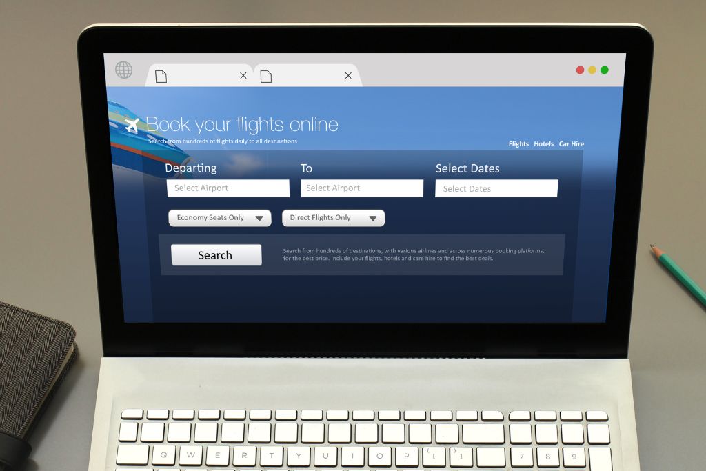 A close up of a laptop screen where there is a flight search engine, one of the tips of how to travel more for less is to sign up for travel deal newsletter