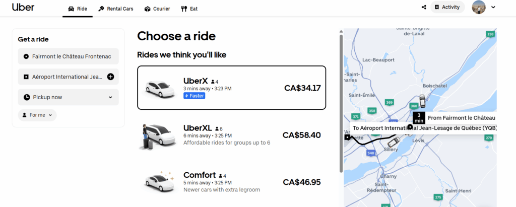 Screenshot of the Uber website interface showing ride options and estimated fares from Fairmont le Château Frontenac to the airport