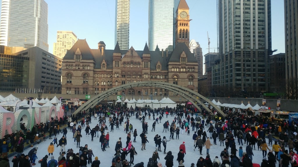 Nathan Philips Square in the winter with skaters