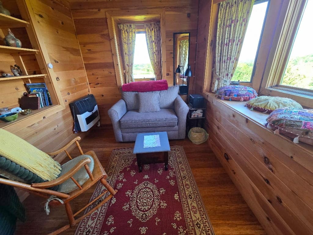 The inside of the Haven on the Hilltop, cozy cabin