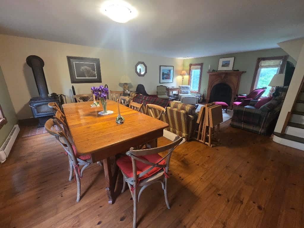 The dining room and living room in the Farmhouse