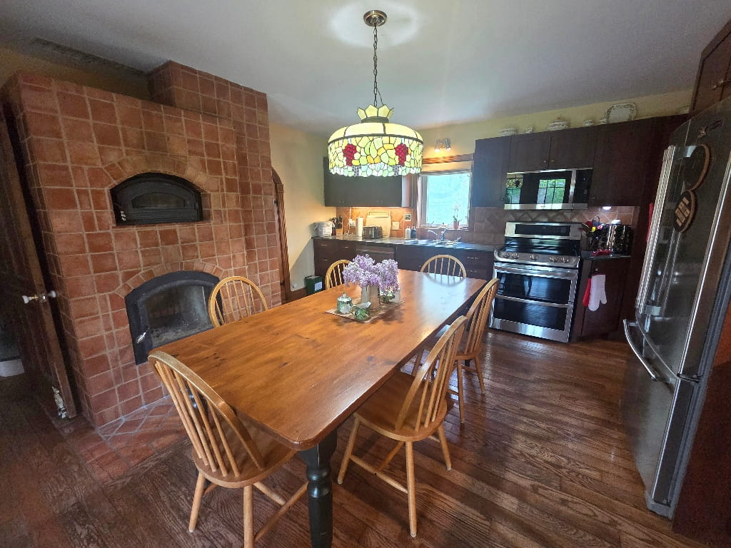The Farmhouse dining room, table with chairs