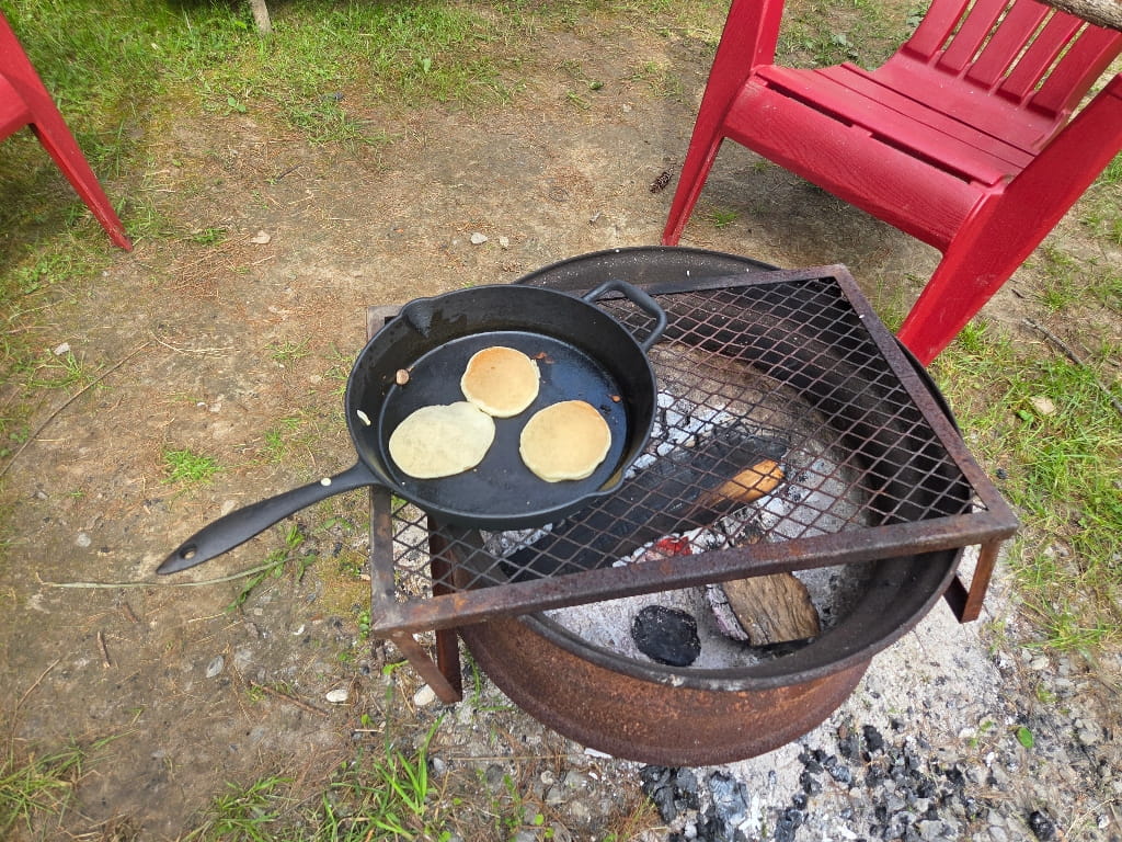 Cooking pancakes over the fire, fire pit