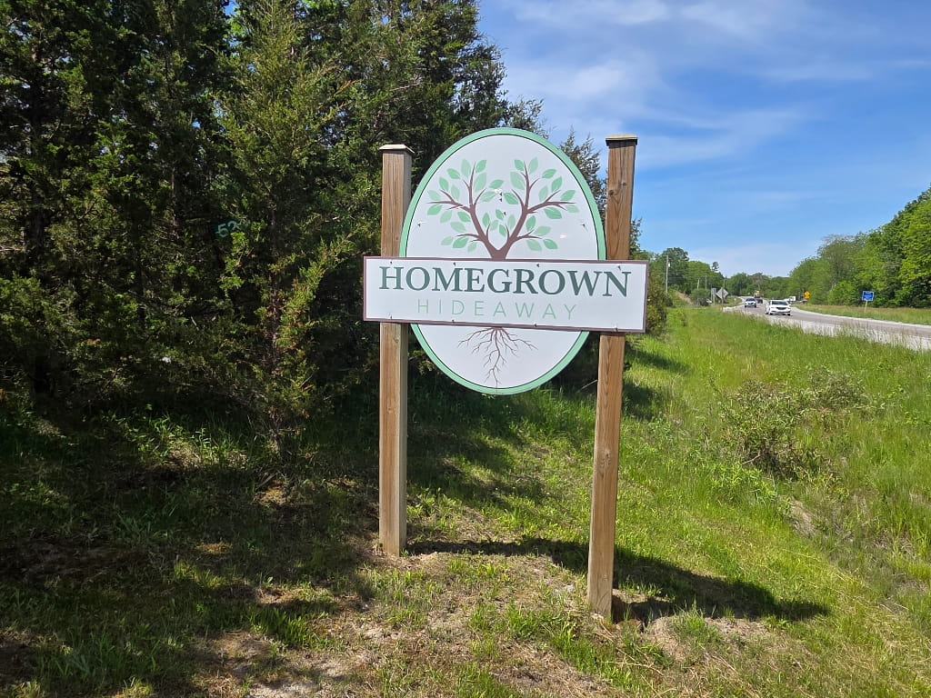 The Homegrown Hideaway sign, glamping location