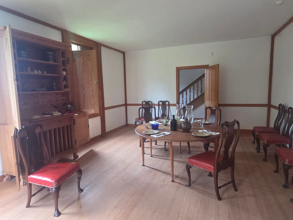 The dining room area of Ferry Farm, large wooden desk