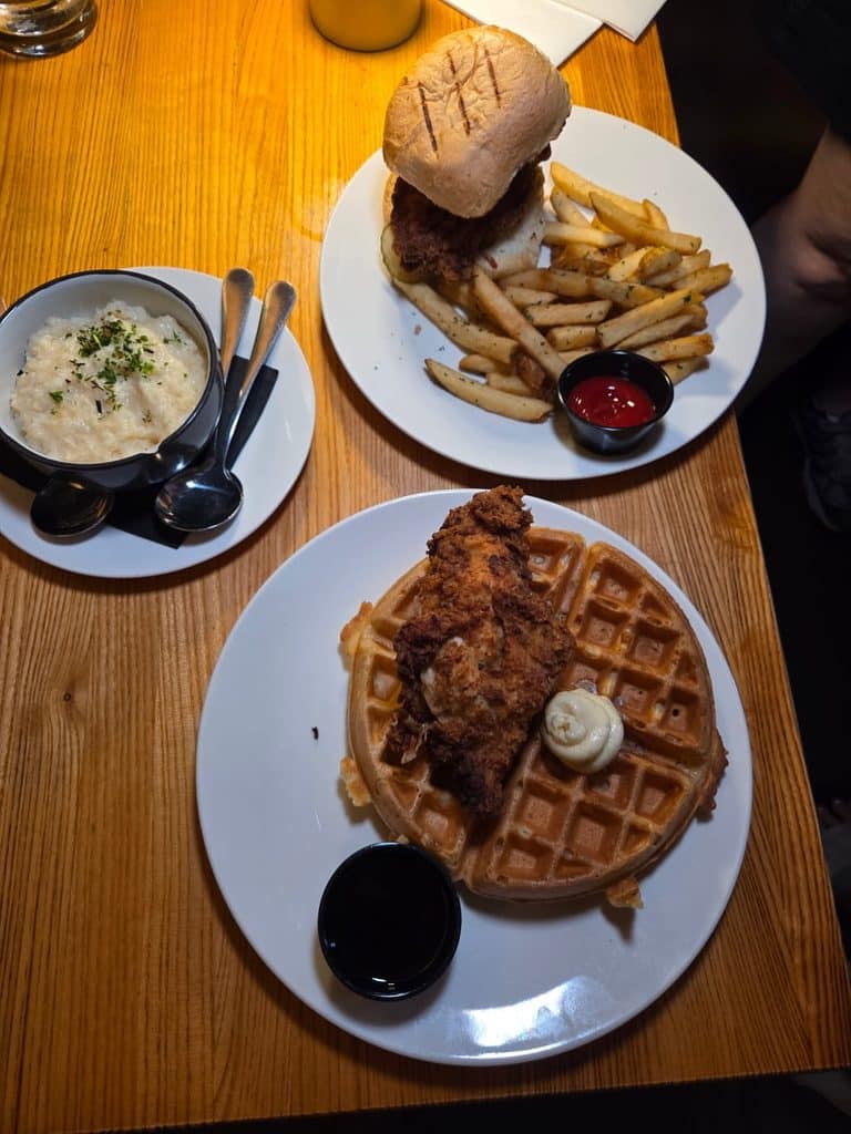The chicken and waffles, organic va mountain grits & Rosie's fried chicken sandwich