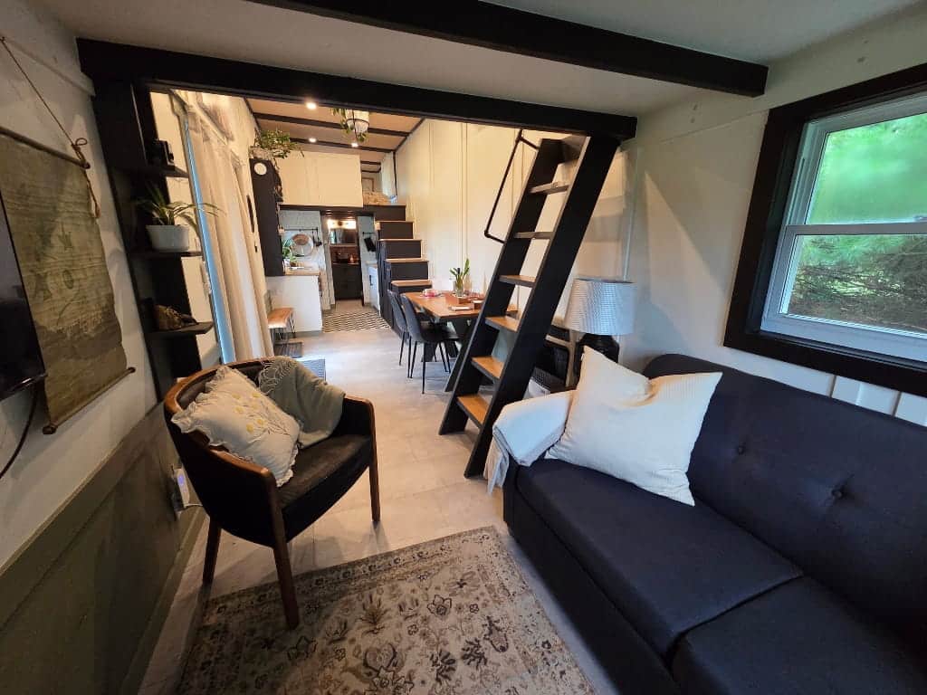 The living room area, couch, chairs